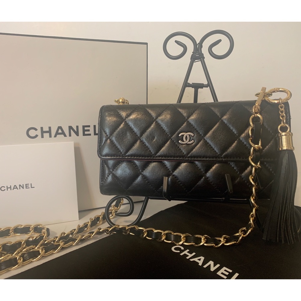 CHANEL Black Quilted Lambskin Crossbody with Gold Chain & Tassel Accent